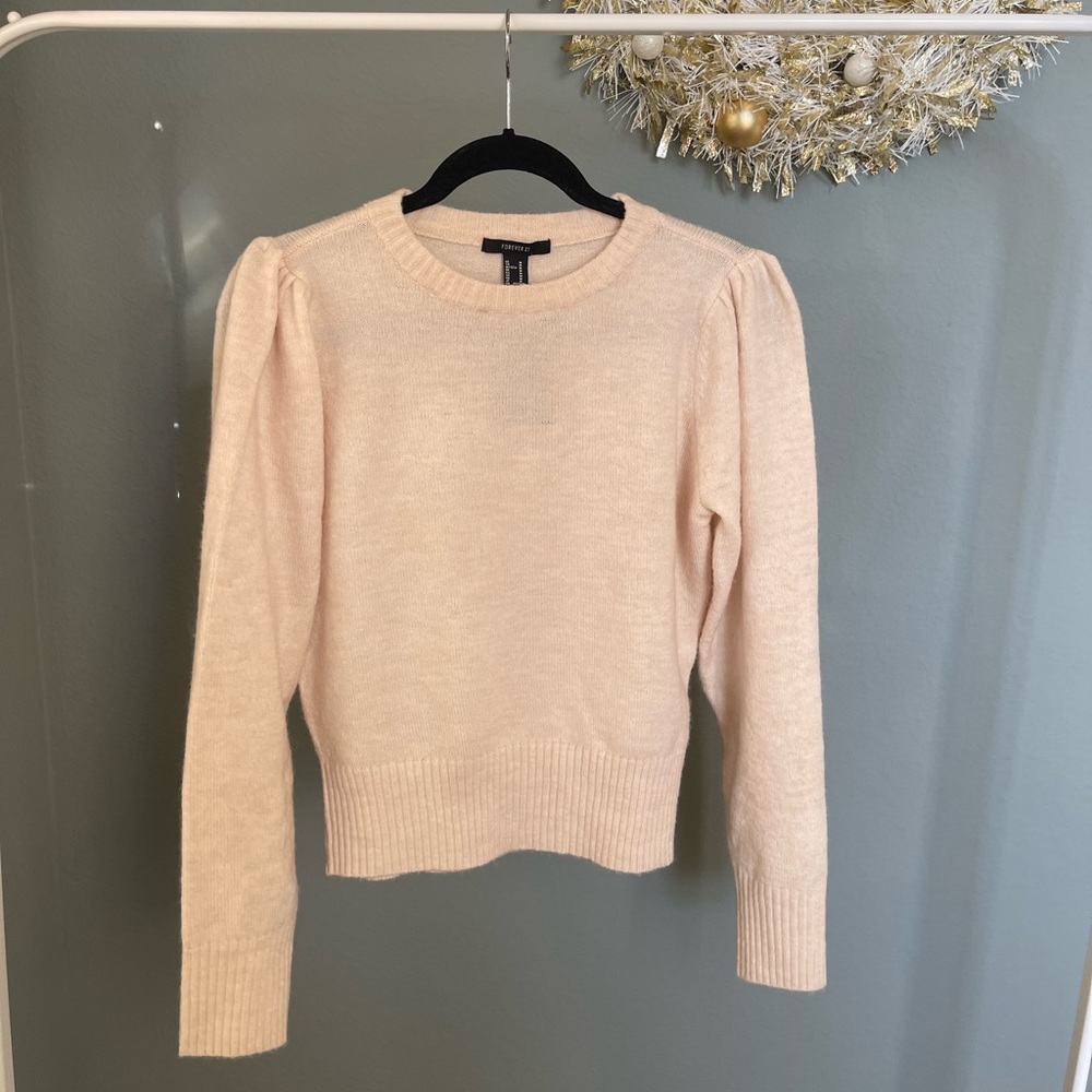 Cream puff sleeve sweater from forever 21. Round neck with ribbed detailing.